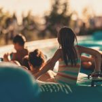 kids on tubs in the wate