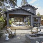 outdoor patio area with a fireplace