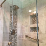 bathroom with accent tiles