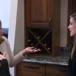woman talking to a Waunakee remodeling employee